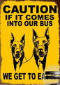 DOBERMAN PLAQUE CAUTION IF IT COMES INTO OUR BUS WE GET TO EAT IT